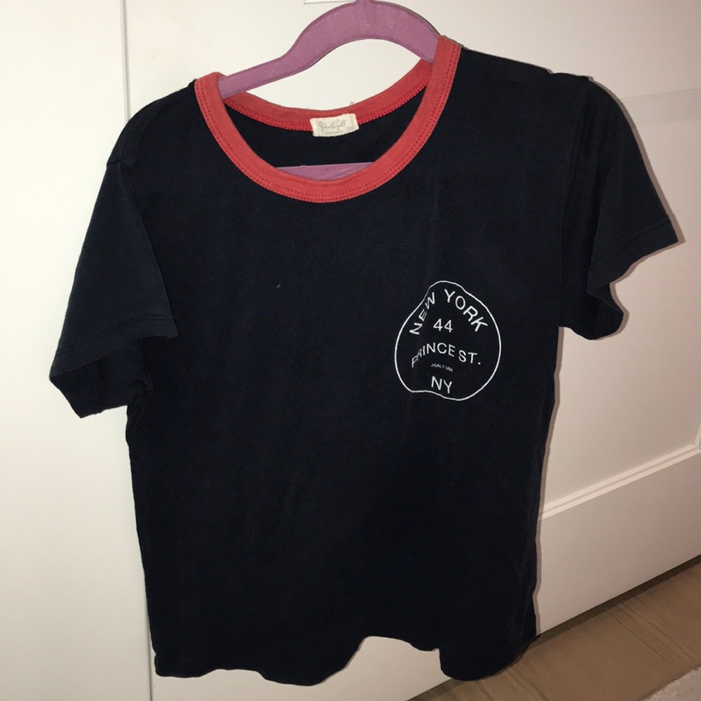 Brandy Melville cropped flowy cropped shirt.